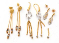 Three pairs of earrings: to include a pair of 18ct three strand drops with tric-colour beads,
