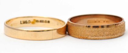 Two 9ct wedding bands: to include a 9ct 5mm wide band with textured band to centre, hallmarked