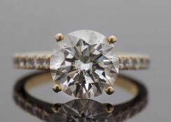 A 3.01cts lab diamond ring, the centre lab grown round brilliant cut diamond, 3.01cts, colour G,