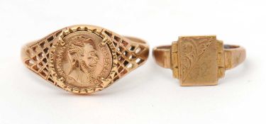 A 9ct coin style ring, with tapering pierced shoulders and plain band hallmarked London 1987, size