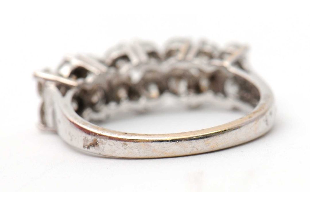 An 18ct diamond ring, set with round brilliant cut diamonds, total estimated approx. 0.36cts, with - Image 4 of 8