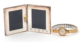 A 9ct cased lady's Excalibur 21 jewel wristwatch, case stamped 375, with bi-metal elasticated strap;