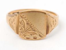 A 9ct signet ring, with central square plaque, tapered shoulders and plain band hallmarked