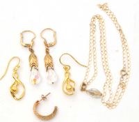 A mixed lot: to include a pair of silver gilt earrings; a crystal pendant stamped 9K on fine trace