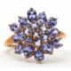 A 9ct tanzanite cluster ring, the cluster formed of round, oval and pear shape tanzanites, with - Image 6 of 7