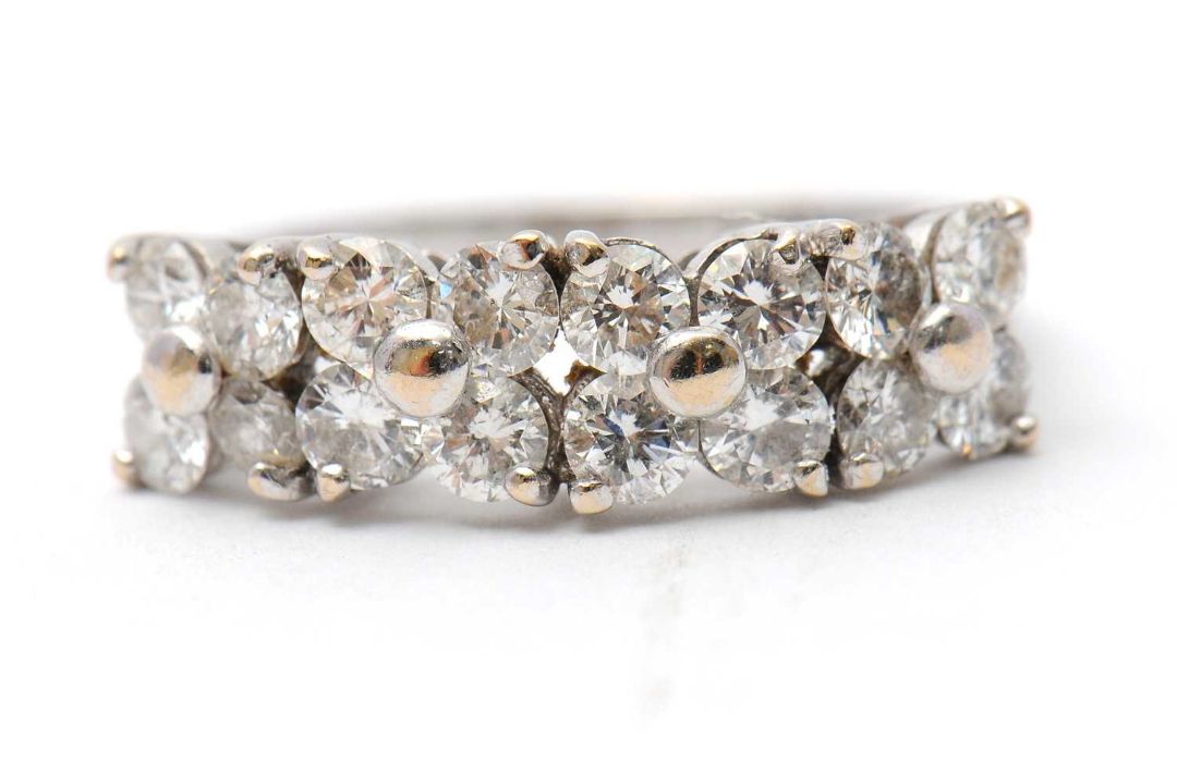 An 18ct diamond ring, set with round brilliant cut diamonds, total estimated approx. 0.36cts, with - Image 7 of 8