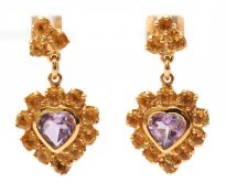 A pair of 9ct amethyst and citrine earrings, with central heart shape amethyst surrounded by round
