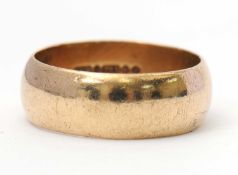 A 9ct wedding band, 8mm wide, hallmarked London 1969, size T, 7.2g