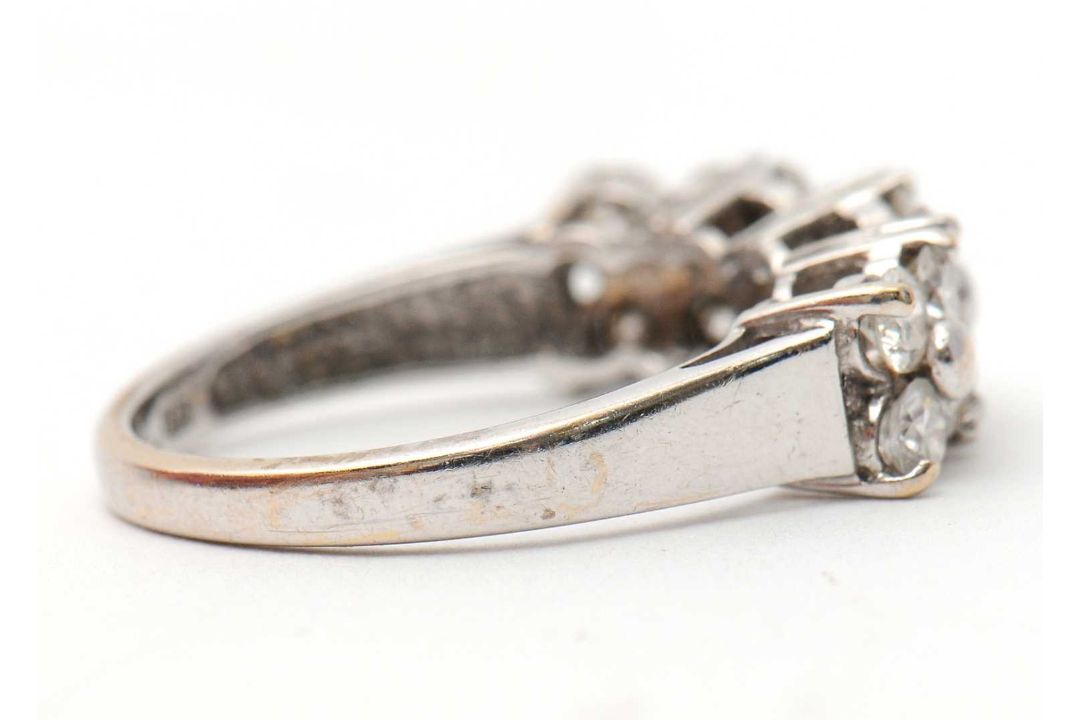 An 18ct diamond ring, set with round brilliant cut diamonds, total estimated approx. 0.36cts, with - Image 3 of 8