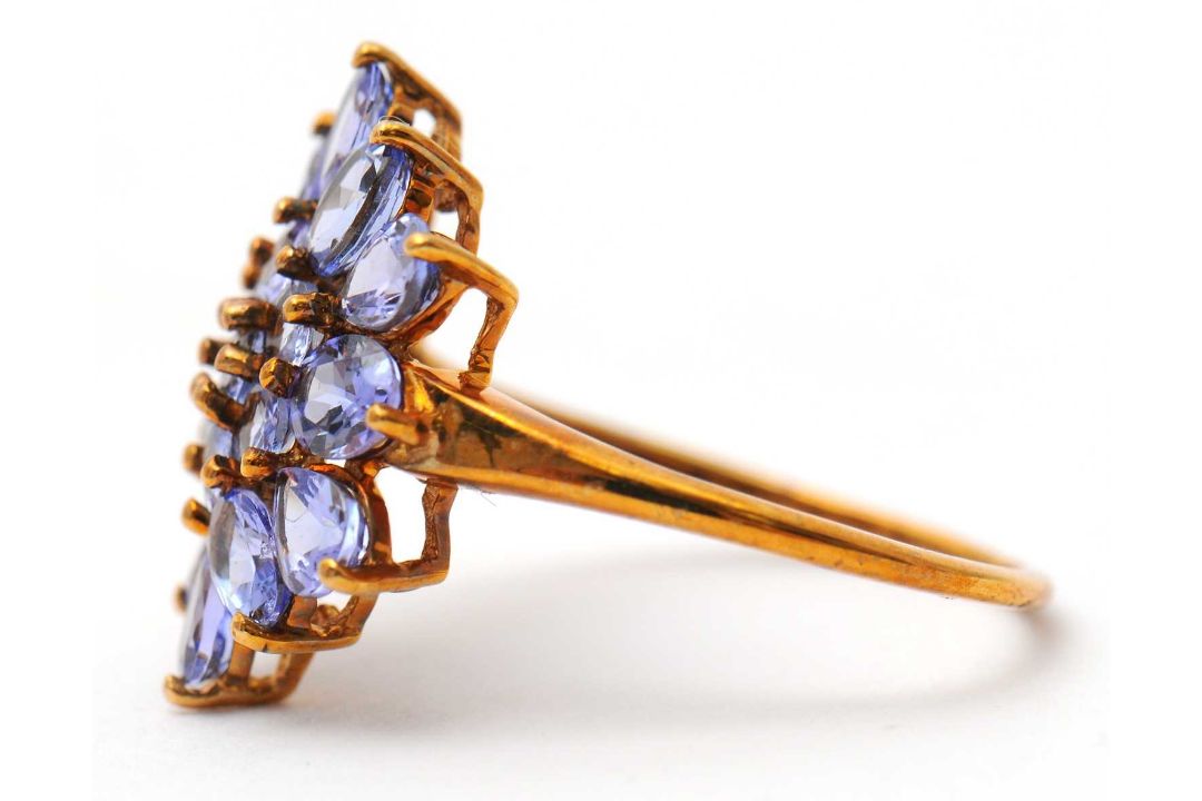 A 9ct tanzanite cluster ring, the cluster formed of round, oval and pear shape tanzanites, with - Image 3 of 7