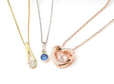 Three necklaces: to include a blue paste necklace with mount stamped 925, on 9ct white gold chain