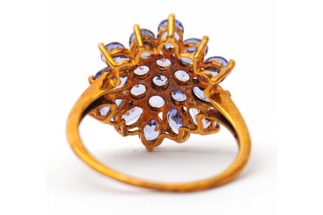 A 9ct tanzanite cluster ring, the cluster formed of round, oval and pear shape tanzanites, with - Image 7 of 7