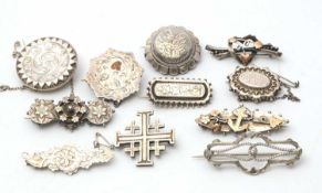 Eleven antique and vintage silver and white metal brooches, 50g gross, (11)