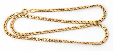 A 9ct necklace, the fancy link chain with fixed tag stamped 9ct and 375 with London import mark