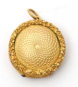 A 19th century viniagrette locket, the round locket with hinged pierced inner panel, all in unmarked