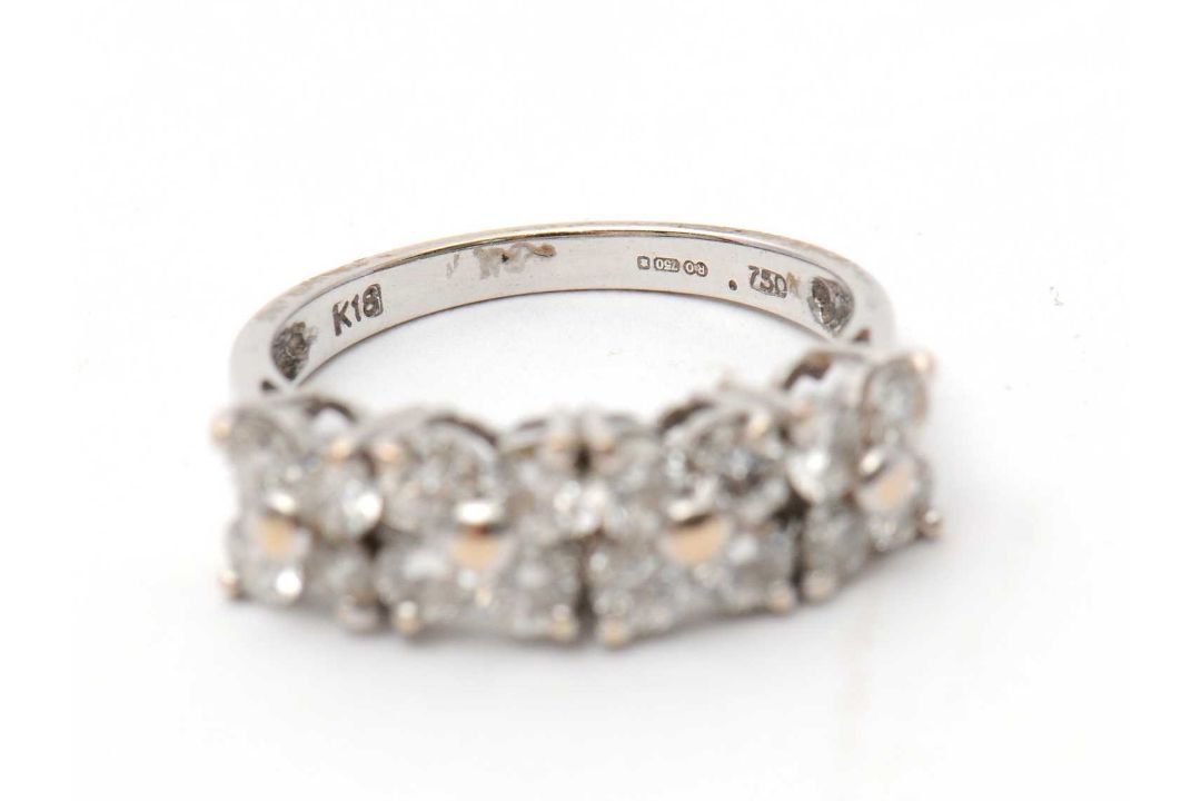 An 18ct diamond ring, set with round brilliant cut diamonds, total estimated approx. 0.36cts, with - Image 6 of 8