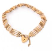 A 9ct gate bracelet, 8.5mm wide, with padlock clasp hallmarked London 1990, 4.7g