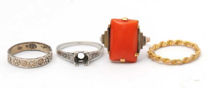Four rings: to include a rope twist style ring stamped 9K, size K, 1.2g; a diamond set ring mount,