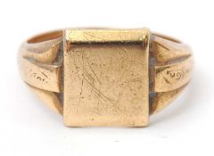 A 9ct signet ring, with central plain square plaque, tapered shoulders and plain band hallmarked