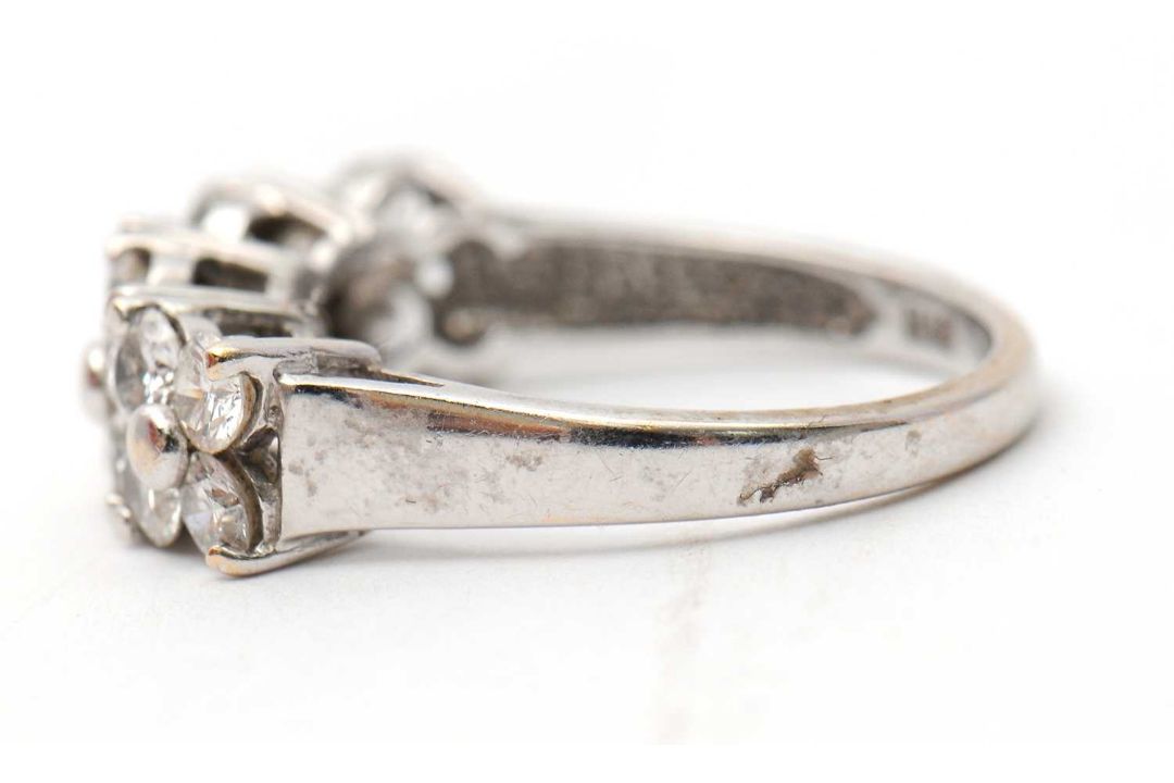 An 18ct diamond ring, set with round brilliant cut diamonds, total estimated approx. 0.36cts, with - Image 5 of 8
