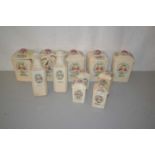 Qty of ceramic jars and covers for tea, coffee, oatmeal etc together with vinegar and oil bottles