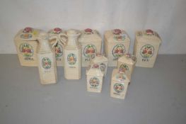 Qty of ceramic jars and covers for tea, coffee, oatmeal etc together with vinegar and oil bottles