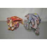 Resin model of a large mythical creature like a dragon together with a further example