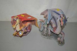 Resin model of a large mythical creature like a dragon together with a further example