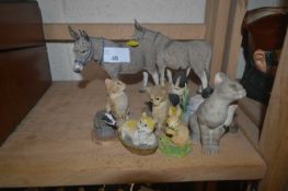 Two mdels of donkeys and other smaller models by Tetley and Sheratt & Simpson of dogs and cats