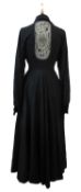 Jean Varon: a black 'spider web' dress, with button front and concealed zip, large pointed collar,