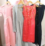 A mixed lot of 1960-70's clothing: to include a pink satin short sleeve dress with white floral