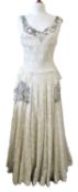 A 1930/40's lace dress, the sleeveless cream lace overlay dress with rounded neck and beaded detail,