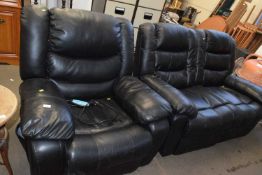 A black leather recliner sofa and matching armchair