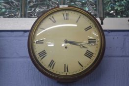 A 19th Century fusee wall clock, the unsigned white 30cm dial with Roman numerals, fitted with a