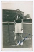 Winifred Alice ‘Freda’ James. 1930s. Sepia real photograph postcard of James standing full length in