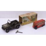 Triang Minic No.2 Series tinplate Jeep, larger scale example, in military green, housed in the