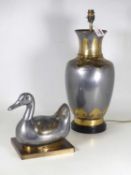 A Chinese pewter figure of a duck, on a brass plinth, w.25cm, together with a similar table lamp,
