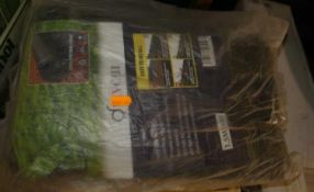 A bundle of various Divchi weed control fabric