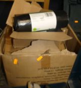 A large box of various black refuse sacks