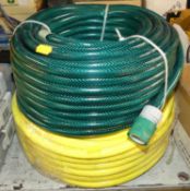 Two brand new lengths of garden hose