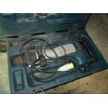 A Bosch heavy duty professional demolition hammer, in carry case
