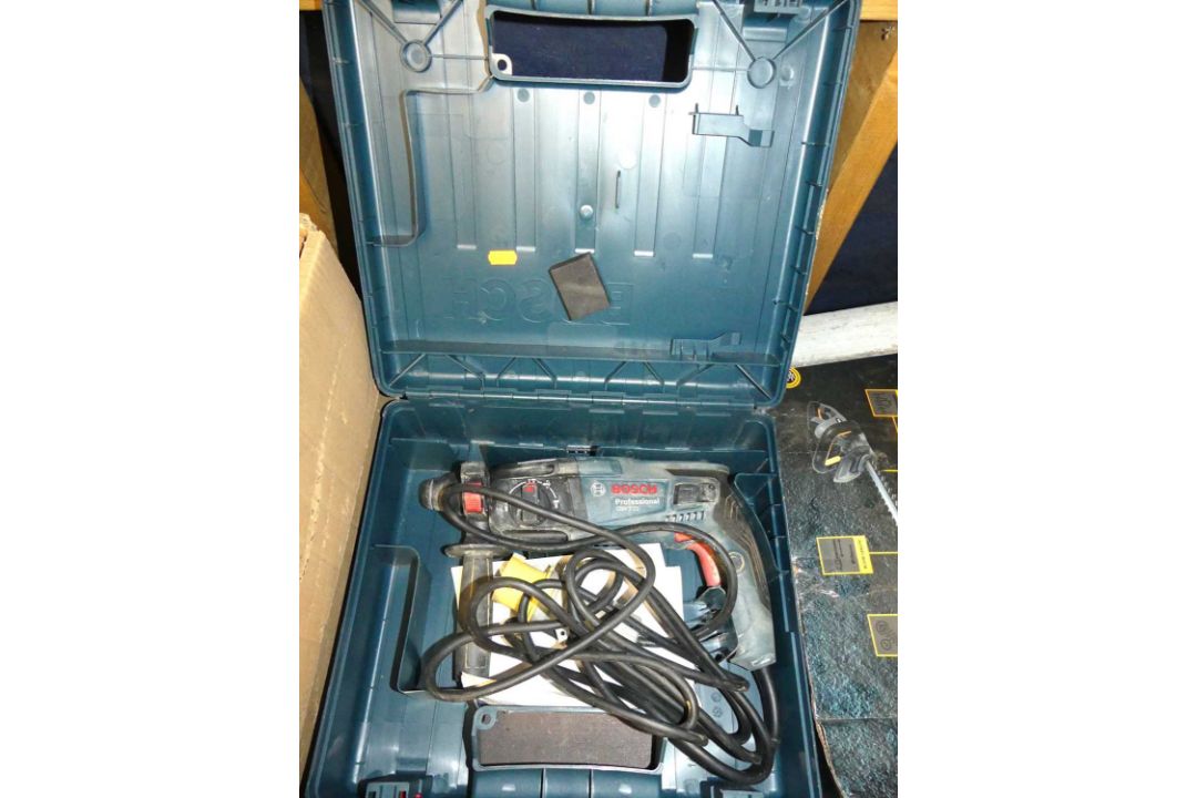 A Bosch Professional GBH 2-21 electric hand drill and carry case