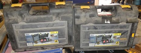 Two carry cases containing a quantity of Fischer resin tools and accessories