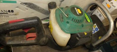 A Qualcast petrol hedge-cutter