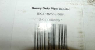 A boxed pipe bender