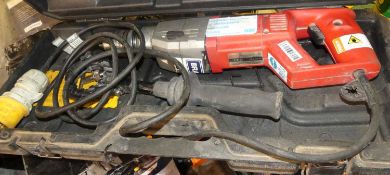 A Milwaukee cased heavy duty electric power drill