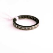 A white metal diamond eternity ring, total diamond weight approx 1ct, tests as 18ct white gold, size