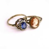 A 9ct gold carved shell cameo set dress ring, size Q, and a 9ct gold blue & white sapphire set