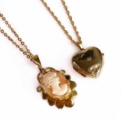 A 9ct gold diamond point set heart shaped locket on trace link neck chain, together with a 9ct