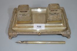 Late Victorian London silver two bottle ink stand (marks rubbed), together with a silver cased quill